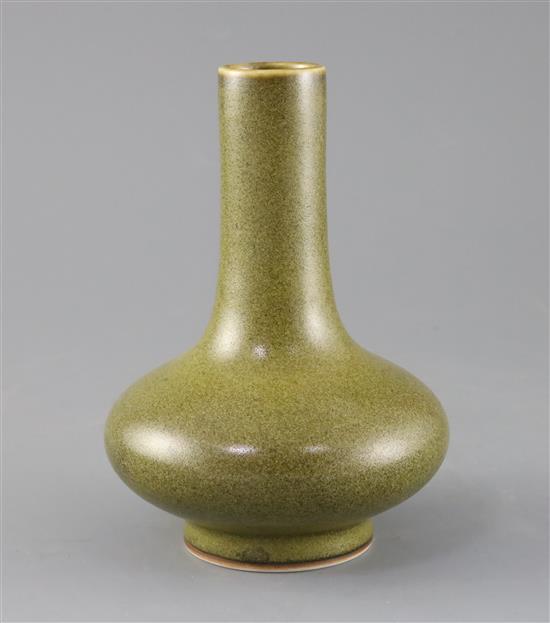 A Chinese teadust glazed bottle vase, H.17cm